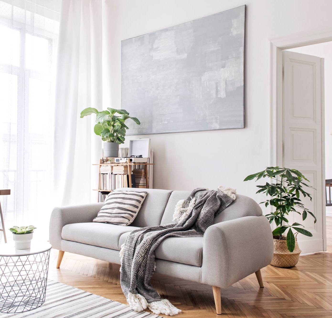 Modern scandianvian living room with design sofa with elegant bl